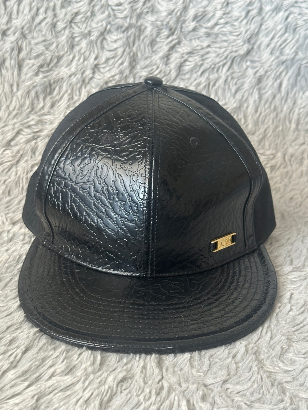 Jordan Black Textured Leather 7 1/4 fitted Hat with Gold Accent